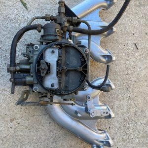 Pipe d’admission avec carburateur